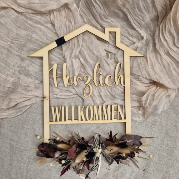 Holzhaus "Herzlich Willkommen"