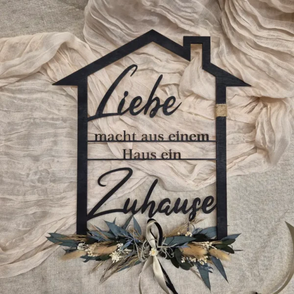 Holzhaus "Liebe macht aus einem Haus ein Zuhause"